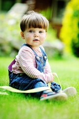 Cute little girl on the meadow