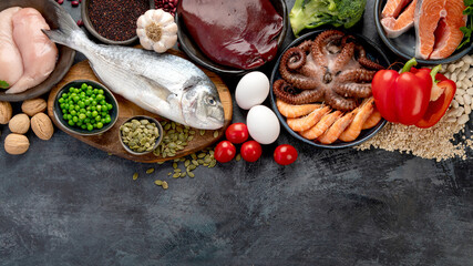 Food high in zinc on dark background. Healthy eating concept.