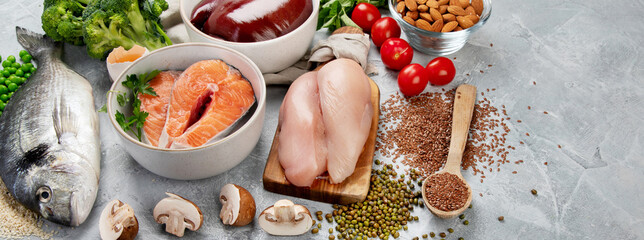 Food high in iron on light gray background. Healthy eating concept.