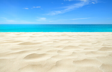 Fototapeta na wymiar Tropical Sandy beach with blue sky background.
