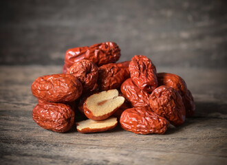 Chinese jujube isolated on wooden background.
