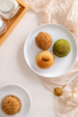 Choux pastry  is a delicate pastry dough used in many pastries. It contains only butter, water, flour, and eggs. Choux pastries are sometimes filled with cream after baking to make cream puffs 