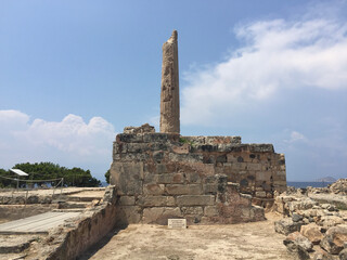 The remnant column of a Doric Temple of Apollo, at the top of the hill of Kolona. Built in 520 BC of the porous Aegina sandstone, it stood on the site of previous temples on the prehistoric acropolis.