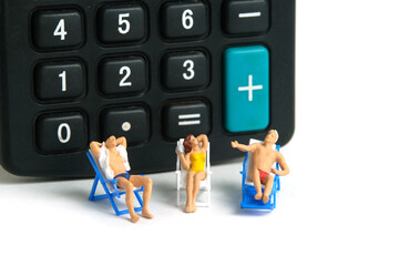 Miniature people toy figure photography. Budget and Financial Plan for travel. Group of men and...