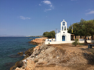 The Saints Anargyroi Church on the coastal road on the island of Aegina, Greece.