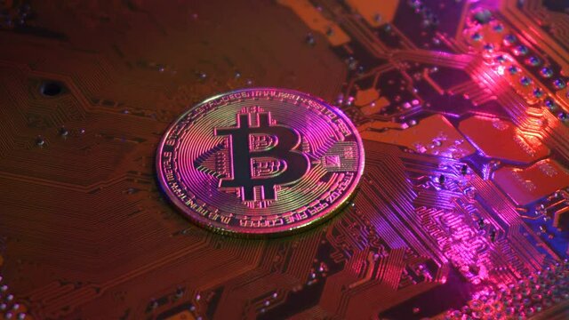 Golden bitcoin coin on server computer motherboard It is the currency that is exchanged and popular today in every country in the world. Concept business technology. Copy spece background