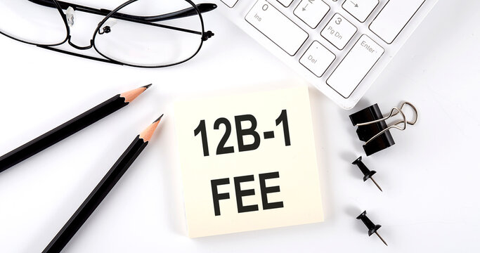 Text 12B -1 FEE on the sticker with keyboard , pencils and office tools