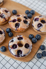 sweet home made blueberry donuts on a table