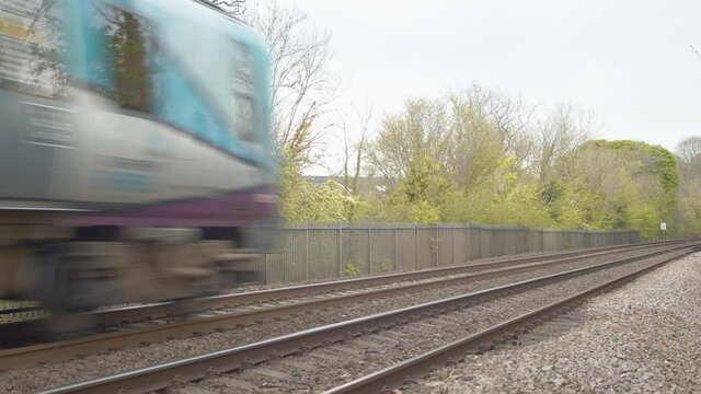 Watching a train passing by on it's way to the station.