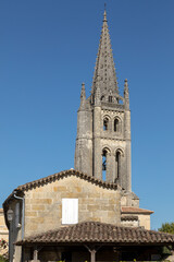 Fototapeta na wymiar Bell tower of Monolithic Church in Saint Emilion. France. St Emilion is French village famous for the excellent red wine.
