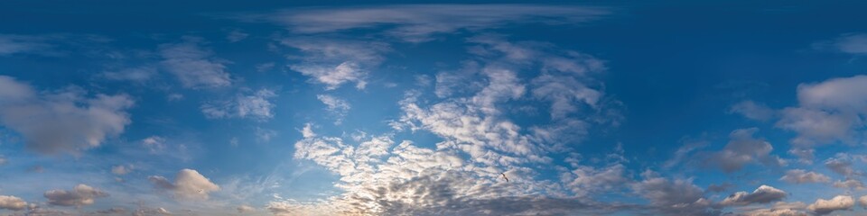 Fototapeta premium Blue sky panorama with Cirrus clouds in Seamless spherical equirectangular format. Full zenith for use in 3D graphics, game and editing aerial drone 360 degree panoramas for sky replacement.