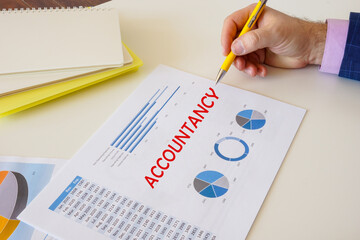 Financial concept about ACCOUNTANCY with inscription on the piece of paper.