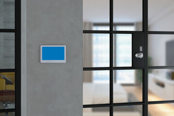 Video intercom display on wall near the entrance door, security system safety in modern apartment.