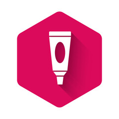 White Cream or lotion cosmetic tube icon isolated with long shadow. Body care products for men. Pink hexagon button. Vector Illustration