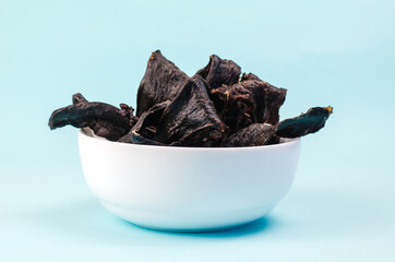 Training treats for pets on blue background. Natural Air Dried d