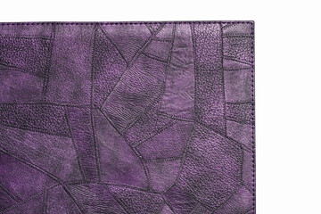 Violet rag-textured leather. Close-up edge isolated at white background