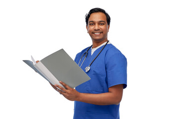 healthcare, profession and medicine concept - happy smiling indian doctor or male nurse in blue uniform with folder report over white background