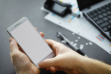 Working time symbolizes the desktop. Office desk with papers from an insurance manager and banker. Office worker at the table. The concept of lack of time.