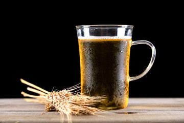 Cold beer and wheat ears