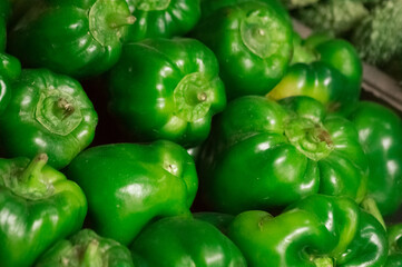 Obraz na płótnie Canvas fresh green capsicum in market most indian used vegetable