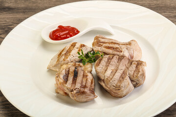 Grilled pork tenderlion with tomato sauce