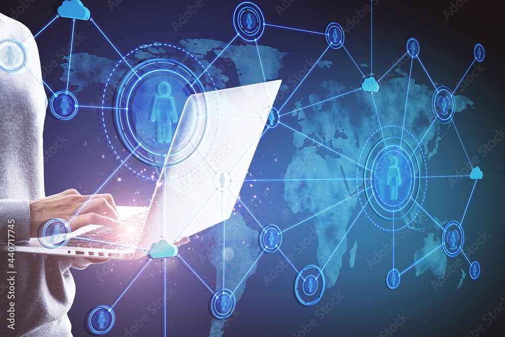 Aufkleber Close up of hands using notebook with abstract social network hologram on blue background. Recruiting and cloud technology concept.