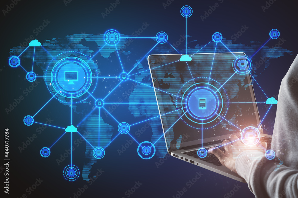 Poster Hand using laptop with abstract computer map and digital icons hologram on blue background. Cloud computing and data storage concept.