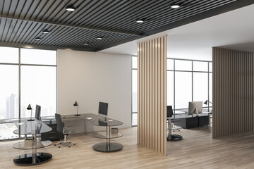 Stylish open space office hall with dark glass tables, wooden partitions and city view from big...