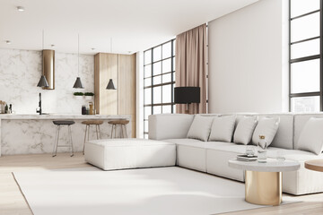 Sunny modern living room interior design with big light sofa on white carpet and stylish kitchen...
