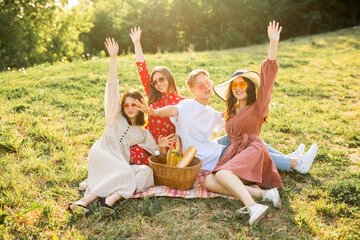 beautiful young people on a summer picnic 