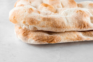 Dough for pinsa romana on light background. Gourmet italian cuisine.