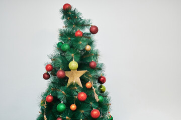 Christmas tree, left on white background