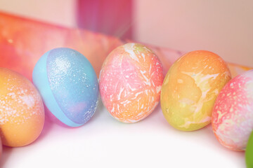 Colored eggs for Easter on a plate 
