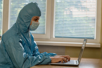 Virologist in a medical mask