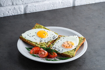 Healthy breakfast egg and avocado sandwich