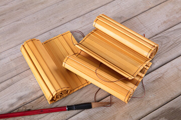 Scattered bamboo slips and a writing brush