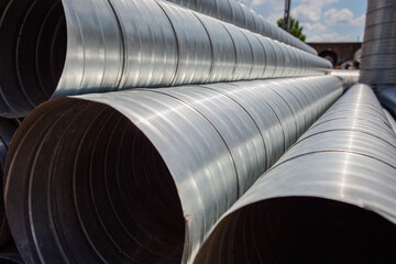 Ventilation pipe warehouse. Steel pipes, parts for the construction of air ducts for an industrial...