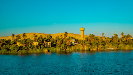 Horizontal Panorama view of a traditional town on the Nile River near Luxor, Egypt