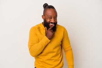 African american man with beard isolated on pink background smiling happy and confident, touching chin with hand.