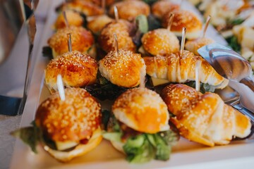 mini burgers on a plate