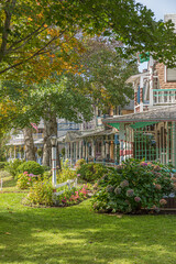 Carpenter Gothic Cottages with Victorian style, gingerbread trim in Wesleyan Grove, town of Oak...
