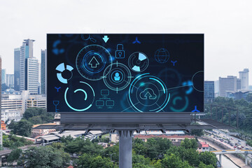 Technology hologram on billboard over panorama city view of Kuala Lumpur. KL is the largest tech...