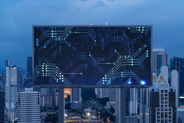 Fototapeta na wymiar Information flow hologram on road billboard, night panorama city view of Kuala Lumpur. KL is the largest technological center in Malaysia, Asia. The concept of programming science.