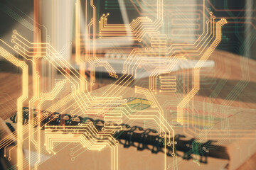 Double exposure of tech drawing and desk with open notebook background. Concept of technology