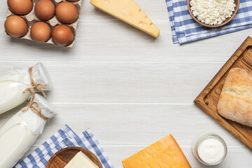 Farm dairy products. Bottle milk, cheeses, cottage cheese, eggs, yogurt, butter, bread. Organic food