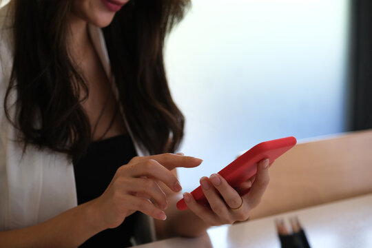 Closed up view with business asian women hands using smartphone, Business and finance concept.
