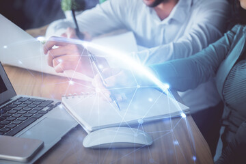 Double exposure of social network theme drawing over people taking notes background. Concept of human connection