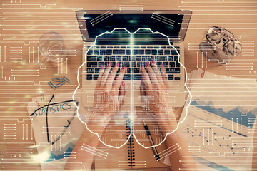 Double exposure of woman working on computer andhuman brain hologram drawing. Top View. Ai concept.