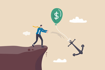 Monetary policy to lower inflation, keep cost or expense low for profit, FED or central bank interest rate control metaphor, businessman government throwing burden anchor tie with money dollar balloon © Nuthawut