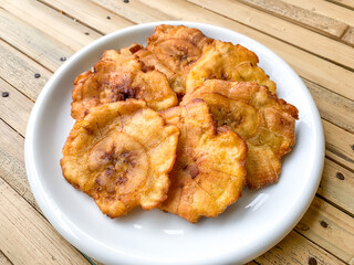 soft focus image of flattened fried banana.